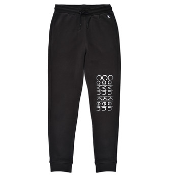 tekstylia Chłopiec Spodnie dresowe Calvin Klein Jeans INSTITUTIONAL CUT OFF LOGO SWEATPANTS Czarny