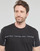 tekstylia Męskie T-shirty z krótkim rękawem Calvin Klein Jeans LOGO TAPE TEE Czarny
