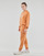 tekstylia Damskie Spodnie dresowe New Balance Essentials Reimagined Archive French Terry Pant Pomarańczowy