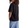 tekstylia Dziewczynka T-shirty z krótkim rękawem Calvin Klein Jeans IG0IG02430 Czarny
